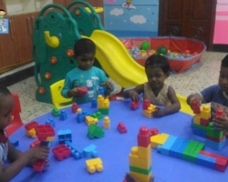 Children playing with Legos