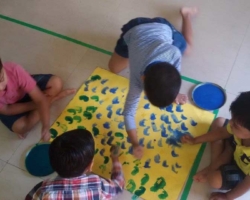 Children doing thumb painting